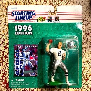 Troy Aikman Starting Lineup Sports Star Collectible, 1996, figurine and card.
